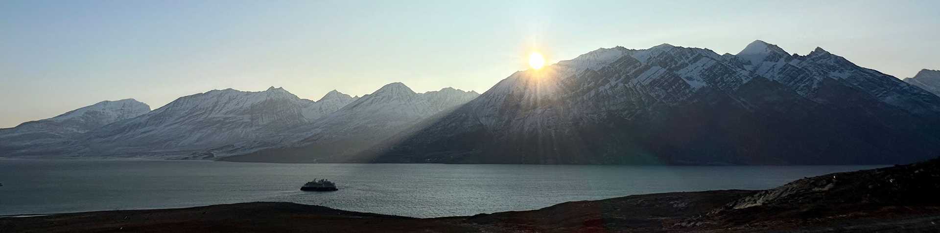 panoramic view of fjords at sunset