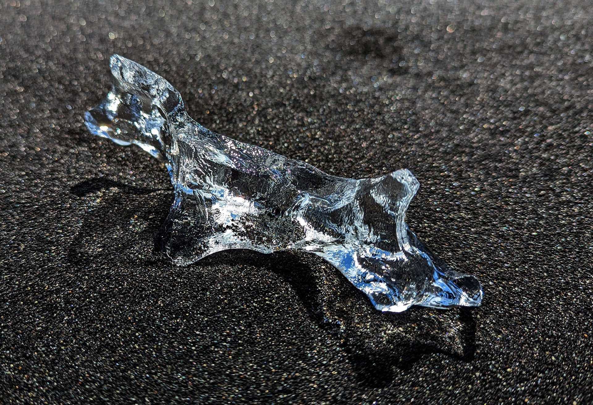 ice on black sand beach